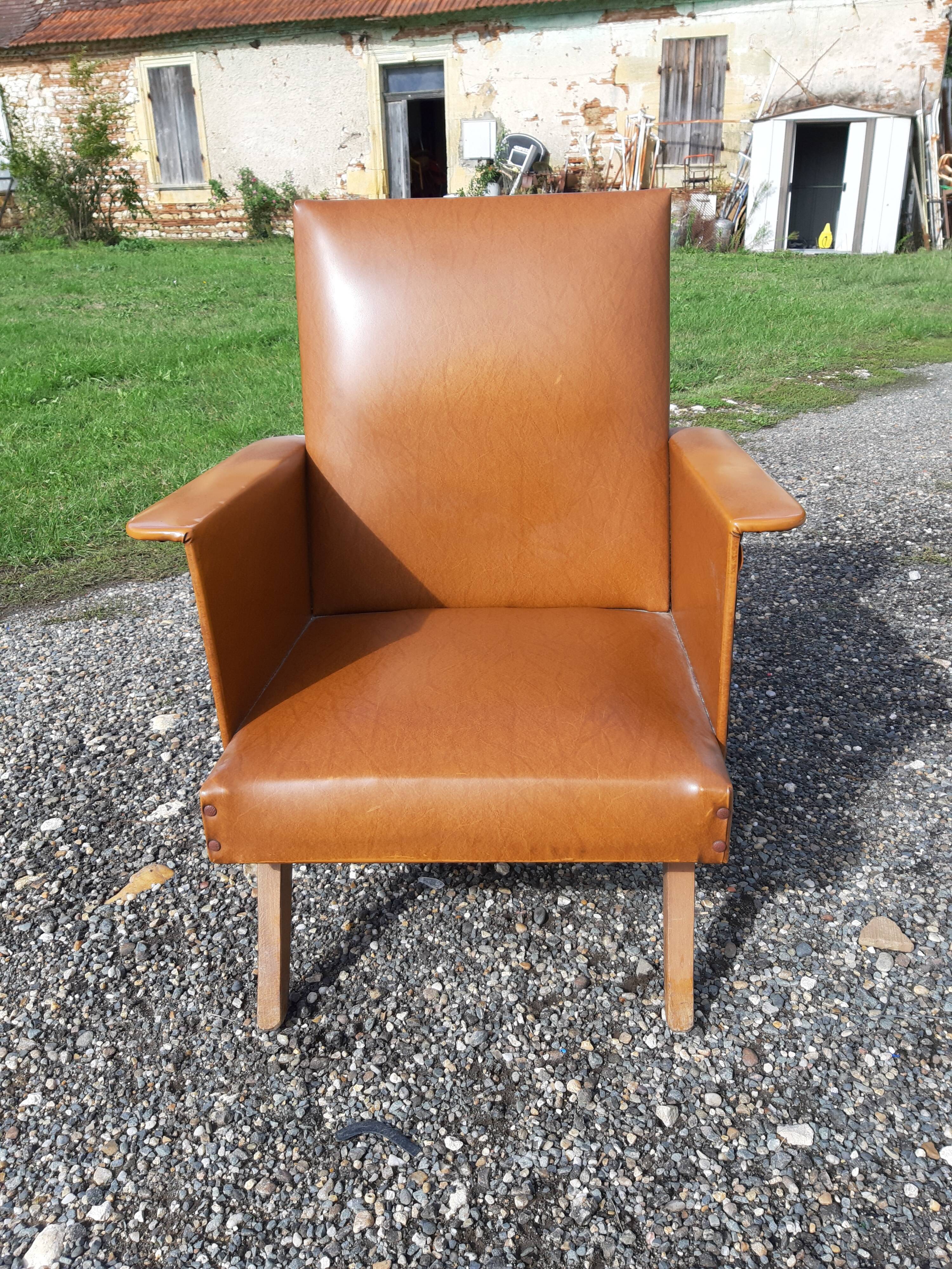 Fauteuil années 60 skai marron