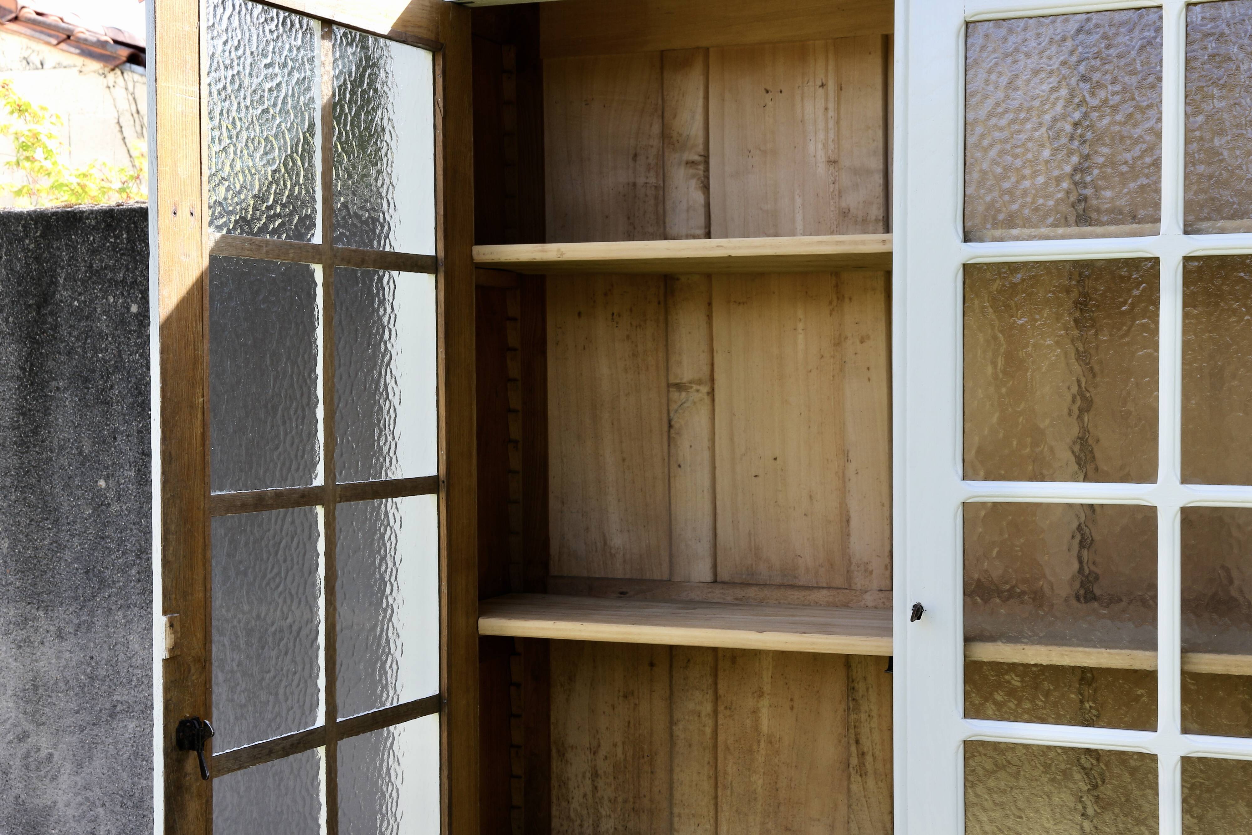 Vintage glass-fronted Parisian wardrobe