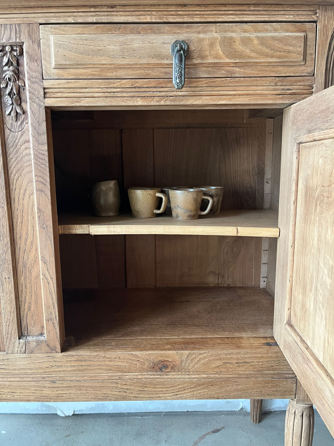 Carved oak sideboard