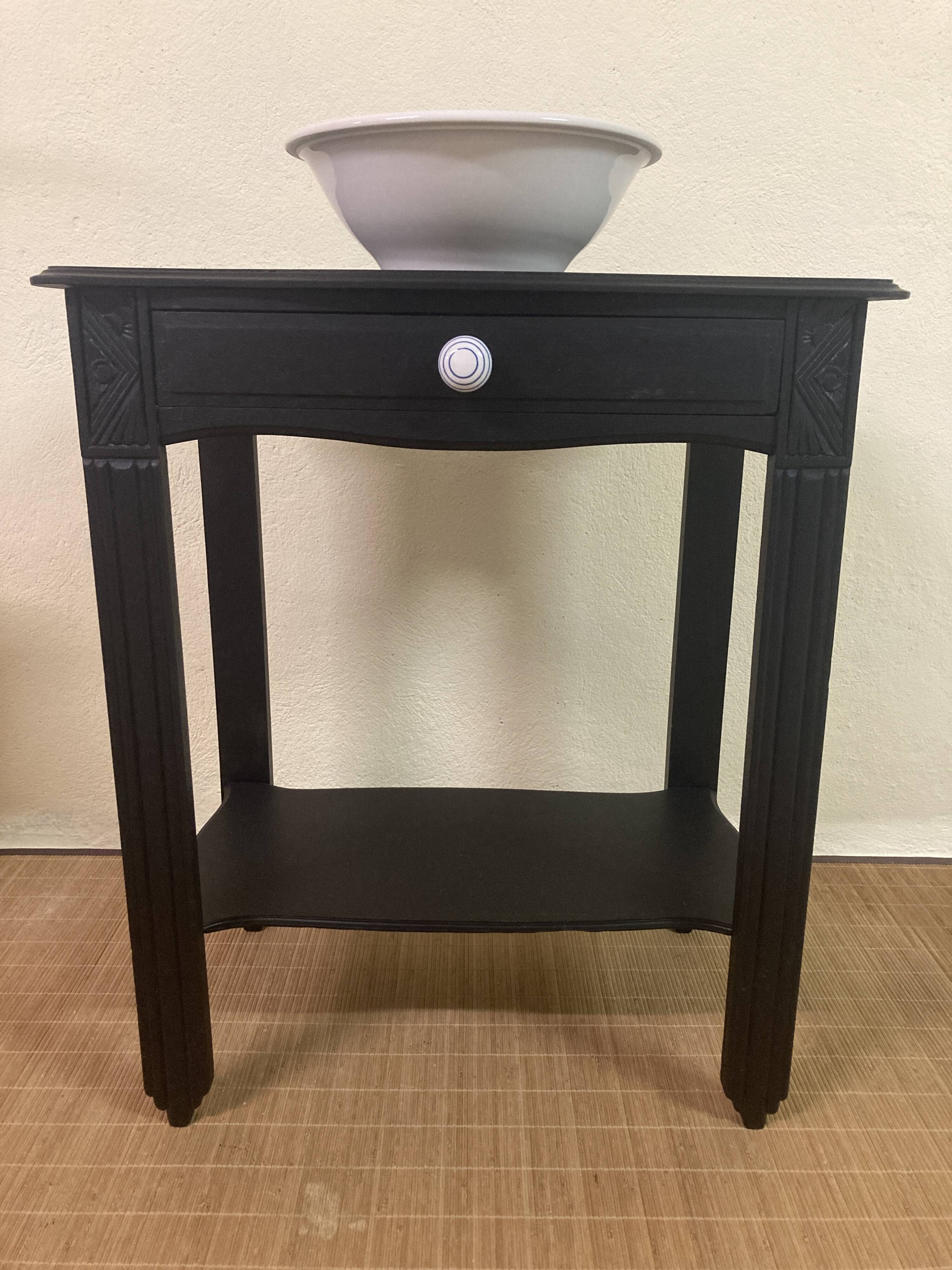 Small Art Deco console reinterpreted – matte black wood with drawer