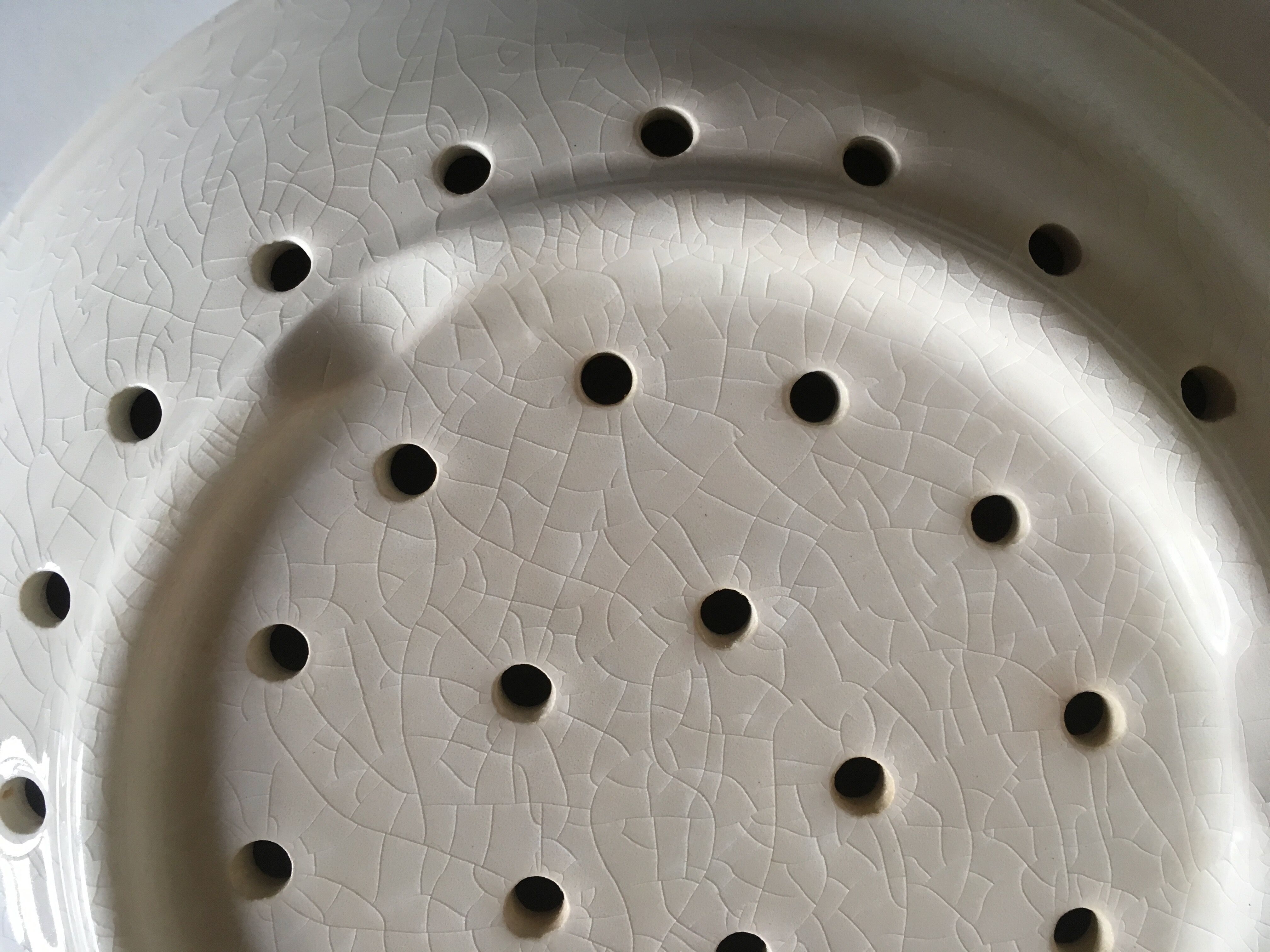 Perforated pheasant plate in 1900s iron earth