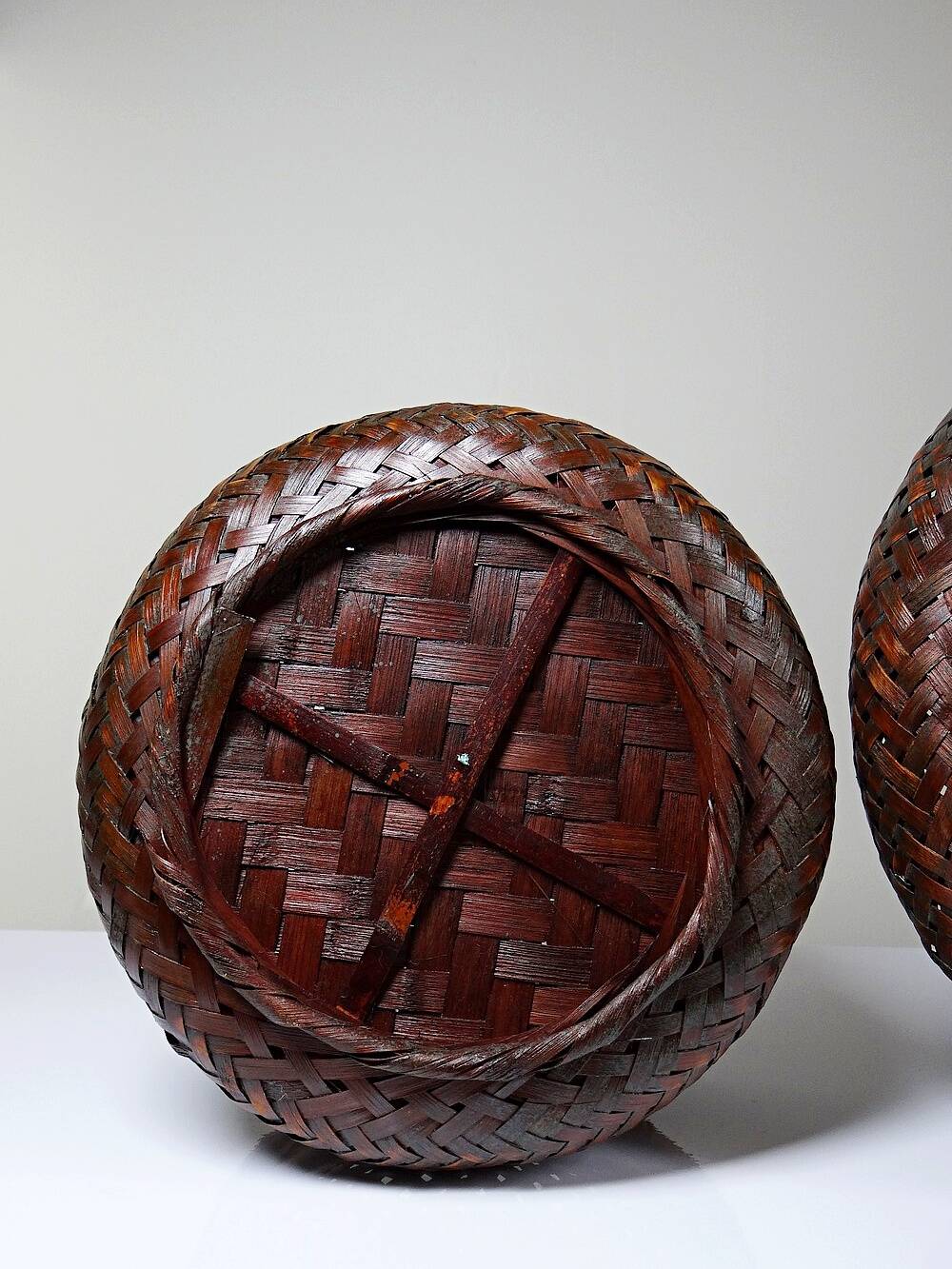 Pair of vintage nesting handmade Japanese woven bamboo baskets