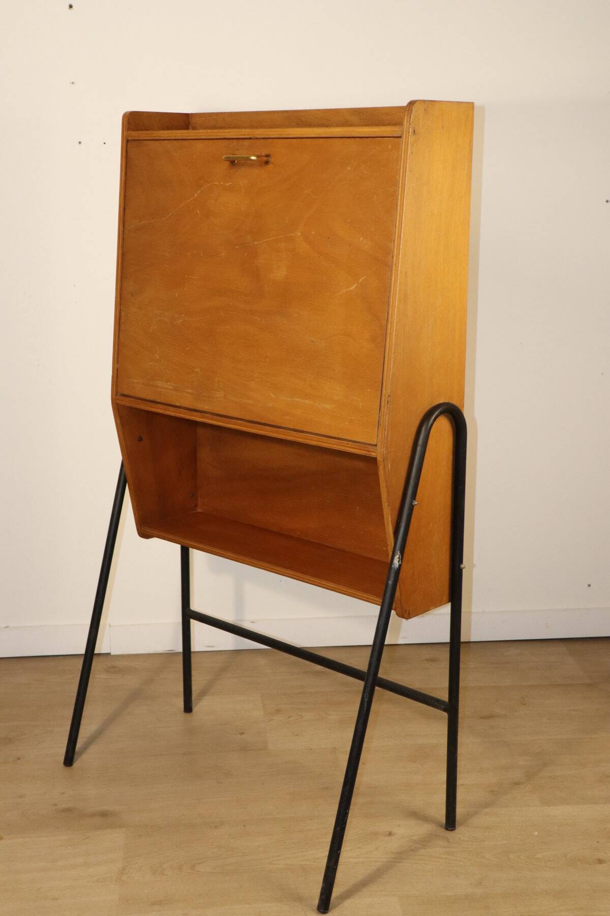 Vintage 1960s wooden secretary with metal legs.
