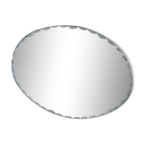 Old beveled oval mirror to pose