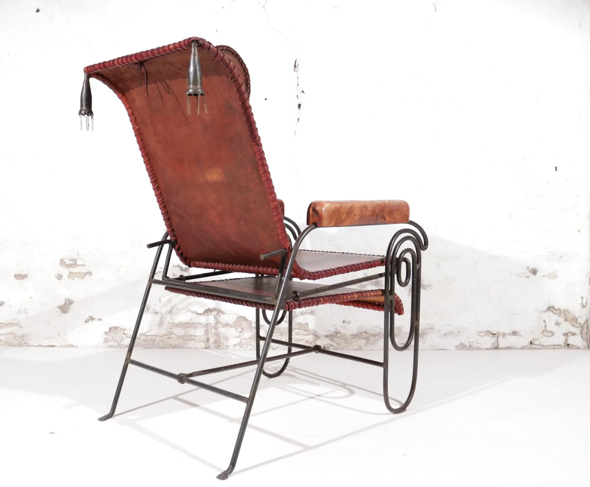 French art deco lounge chair in wrought iron and leather with footrest