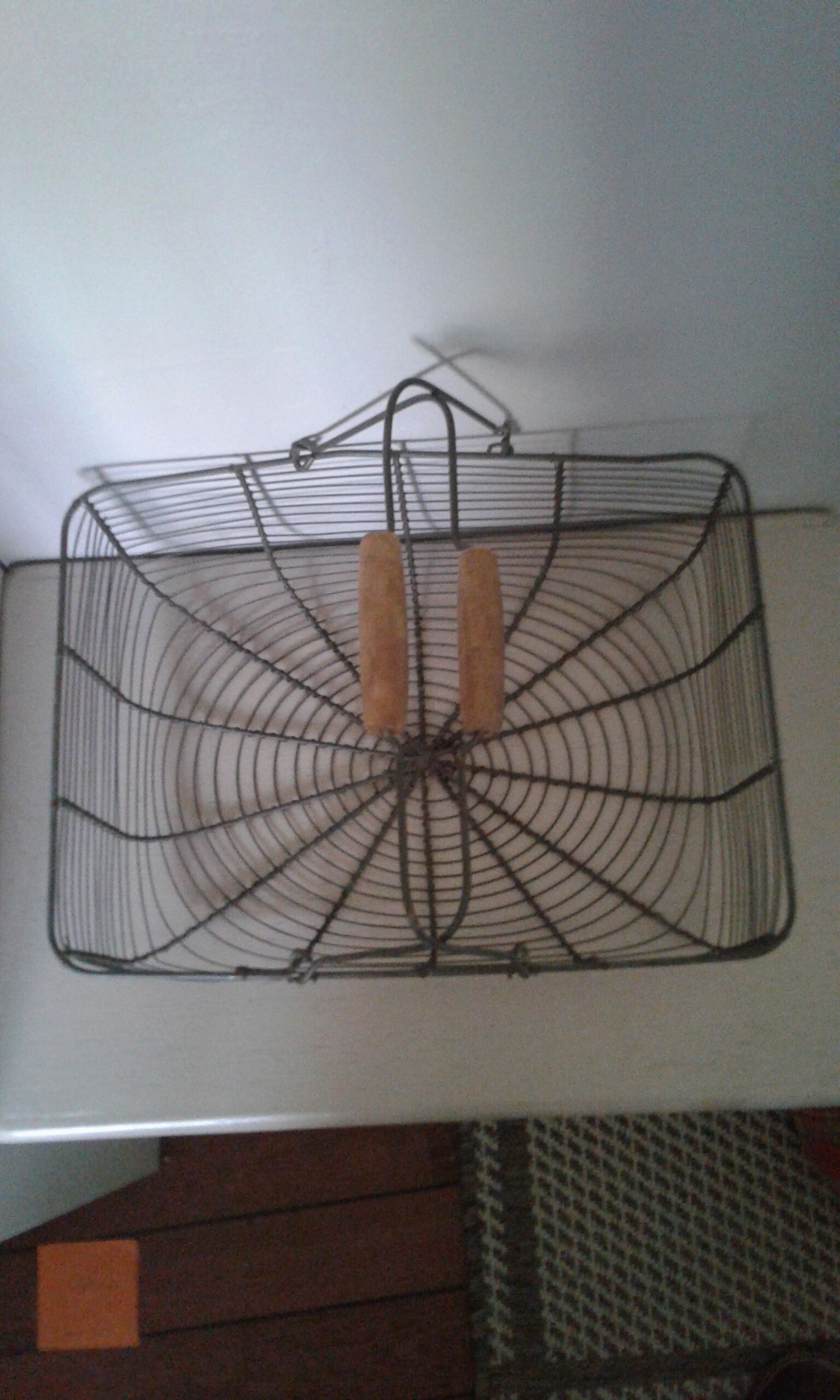Metal basket with wooden handles