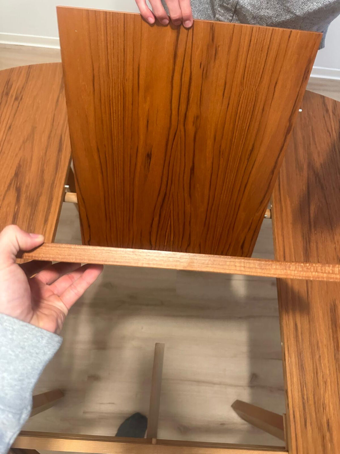 Wooden round table with butterfly extension from the 1970s.