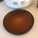 Empty vintage amber glass pocket