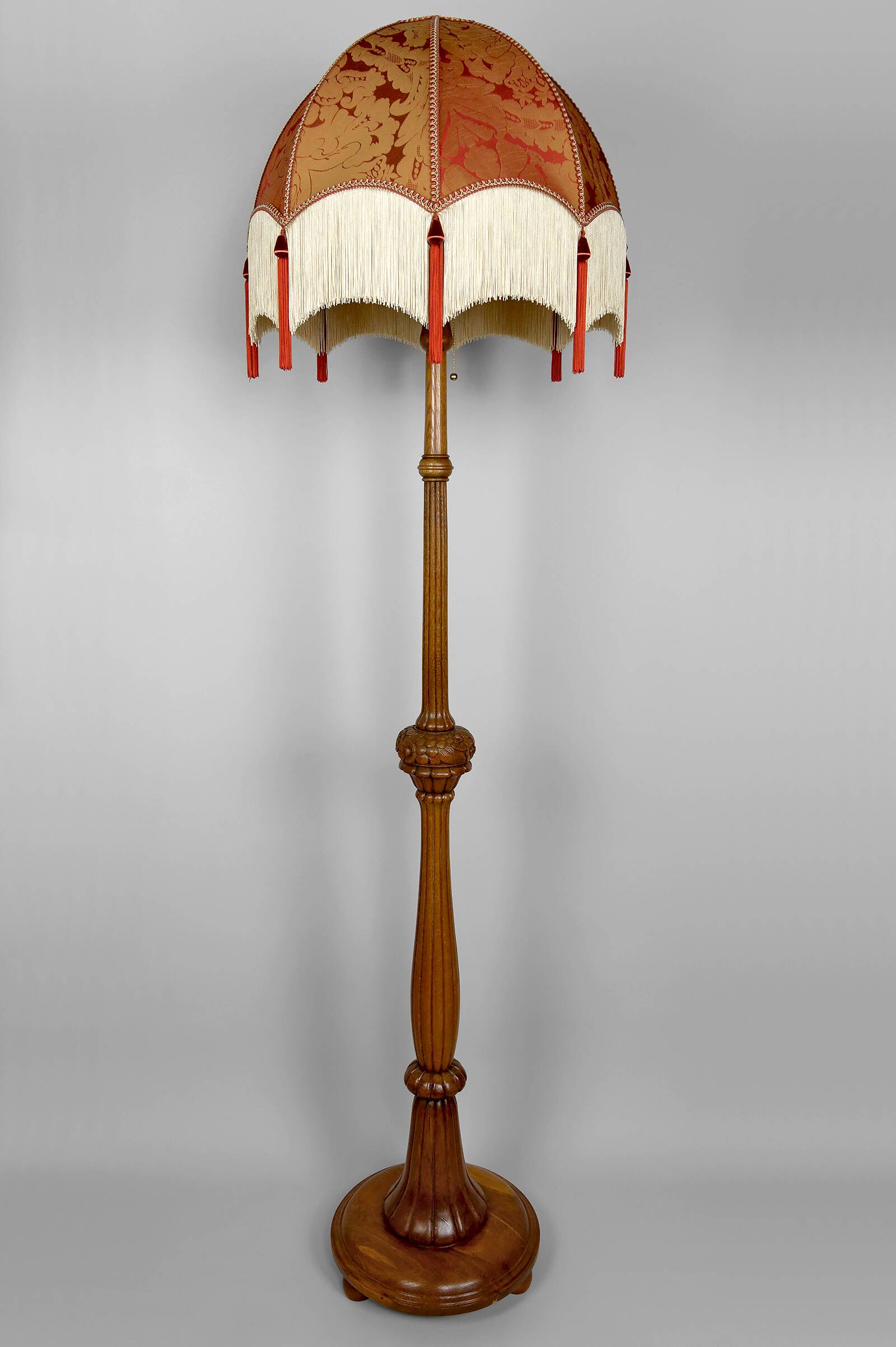 Important Art Deco carved oak floor lamp, France, circa 1920