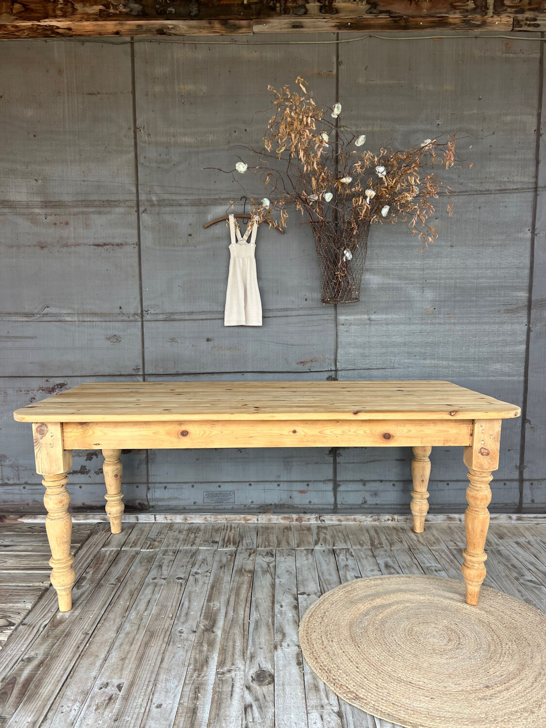 Old farmhouse table in raw wood