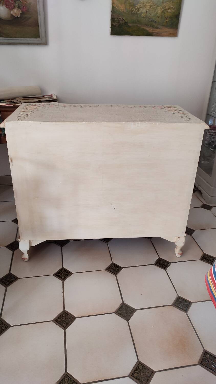 Painted chest of drawers with floral decoration