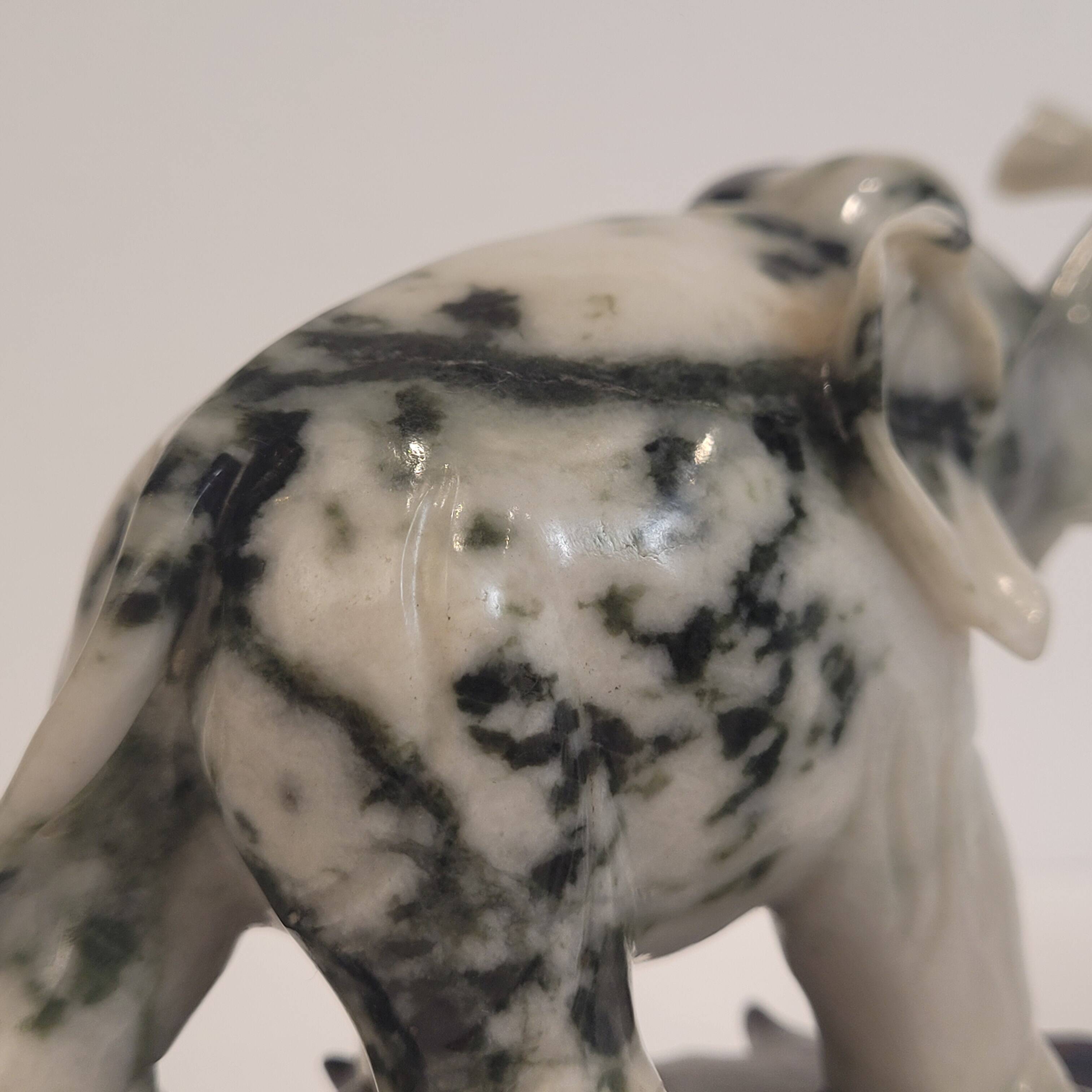 Pair of elephant paperweights, veined marble, 80s - France