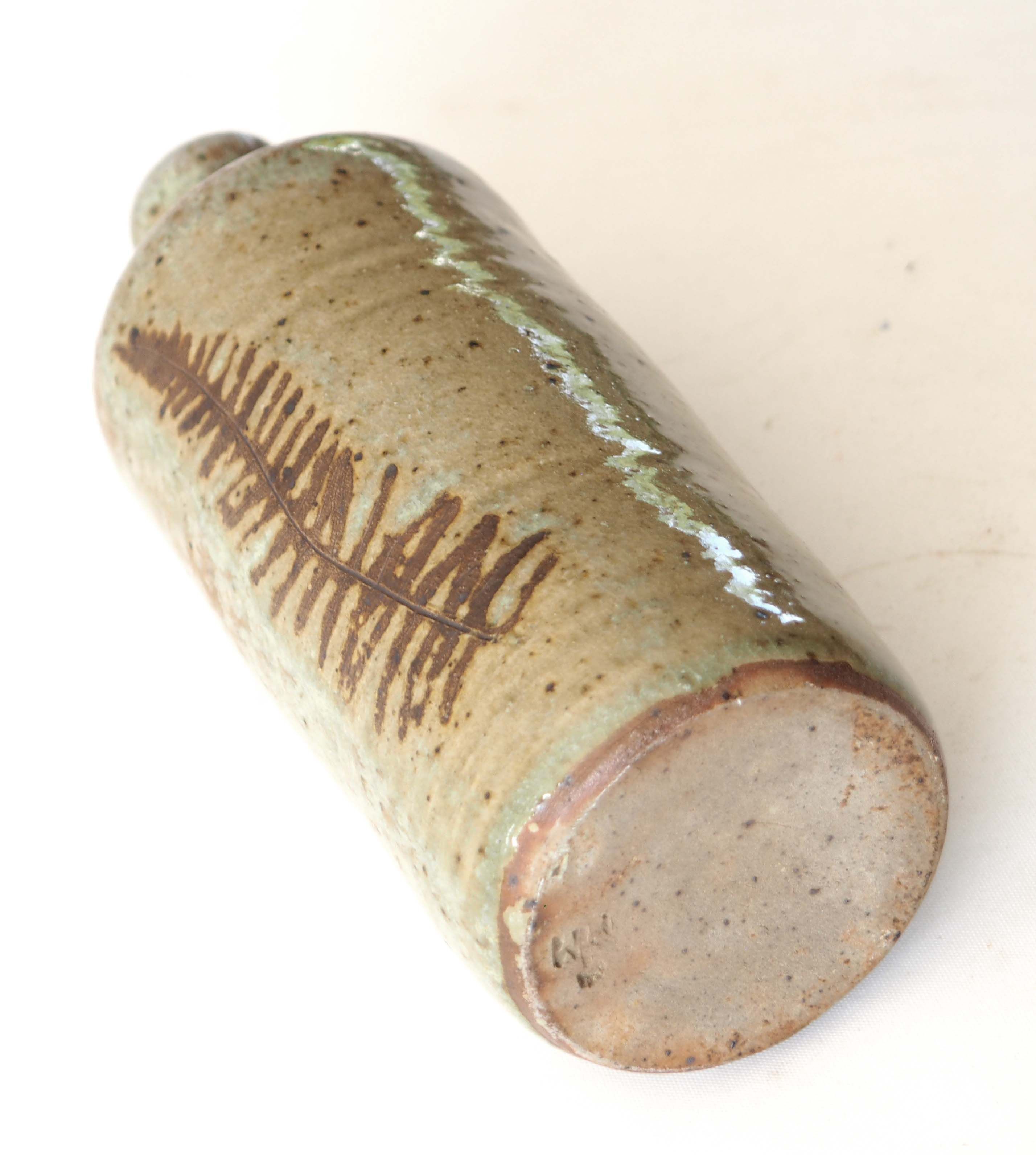 Leaf pattern stoneware bottle