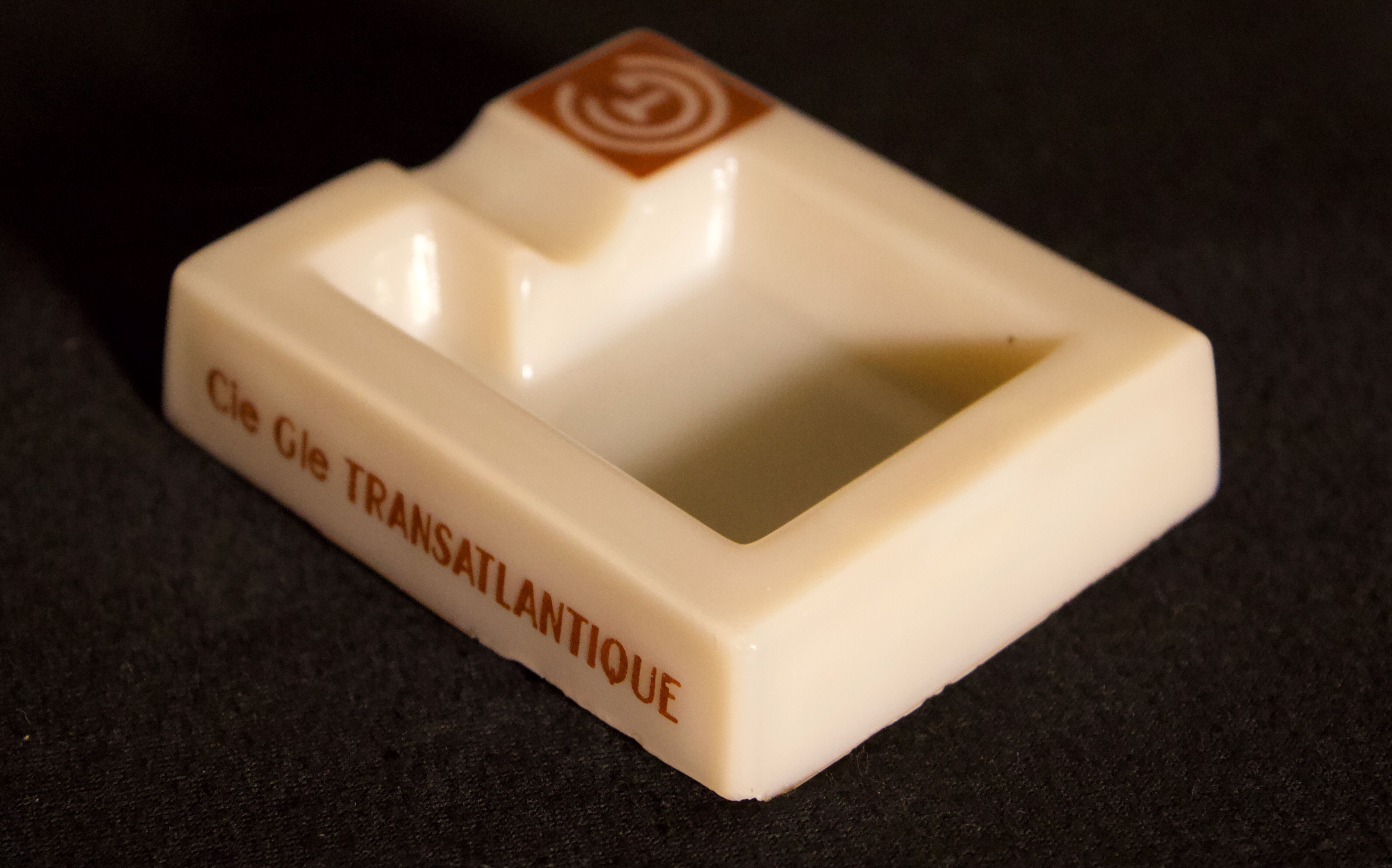 Three opalex ashtrays at the Logo of the Trans-Atlantic General Company - French Line - Model created by Jean Luce for the cruises of the liner Normandy and France