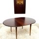 Danish round dining table in rosewood – 1950s design with butterfly extension.