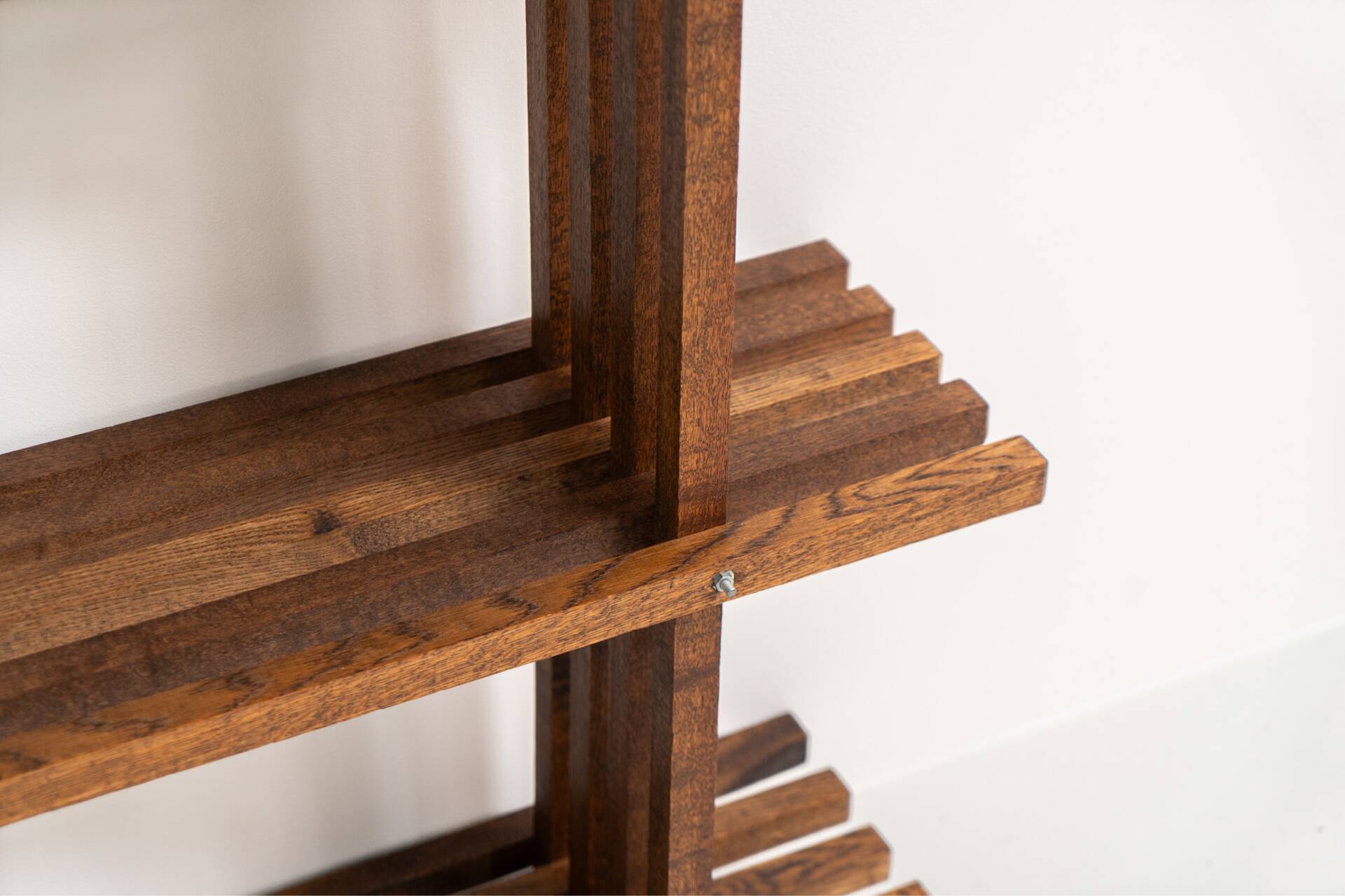 Sculptural wengé slat bookcase (Europe, 1960s).
