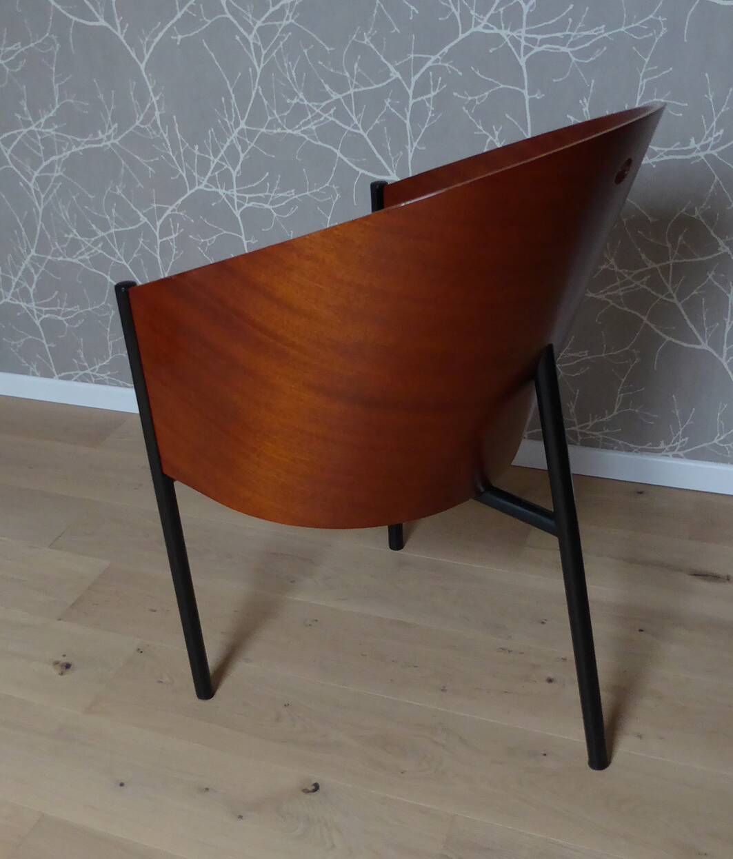 Coste mahogany and black armchair