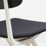 Friso Kramer "Result" chair upholstered in black and white.