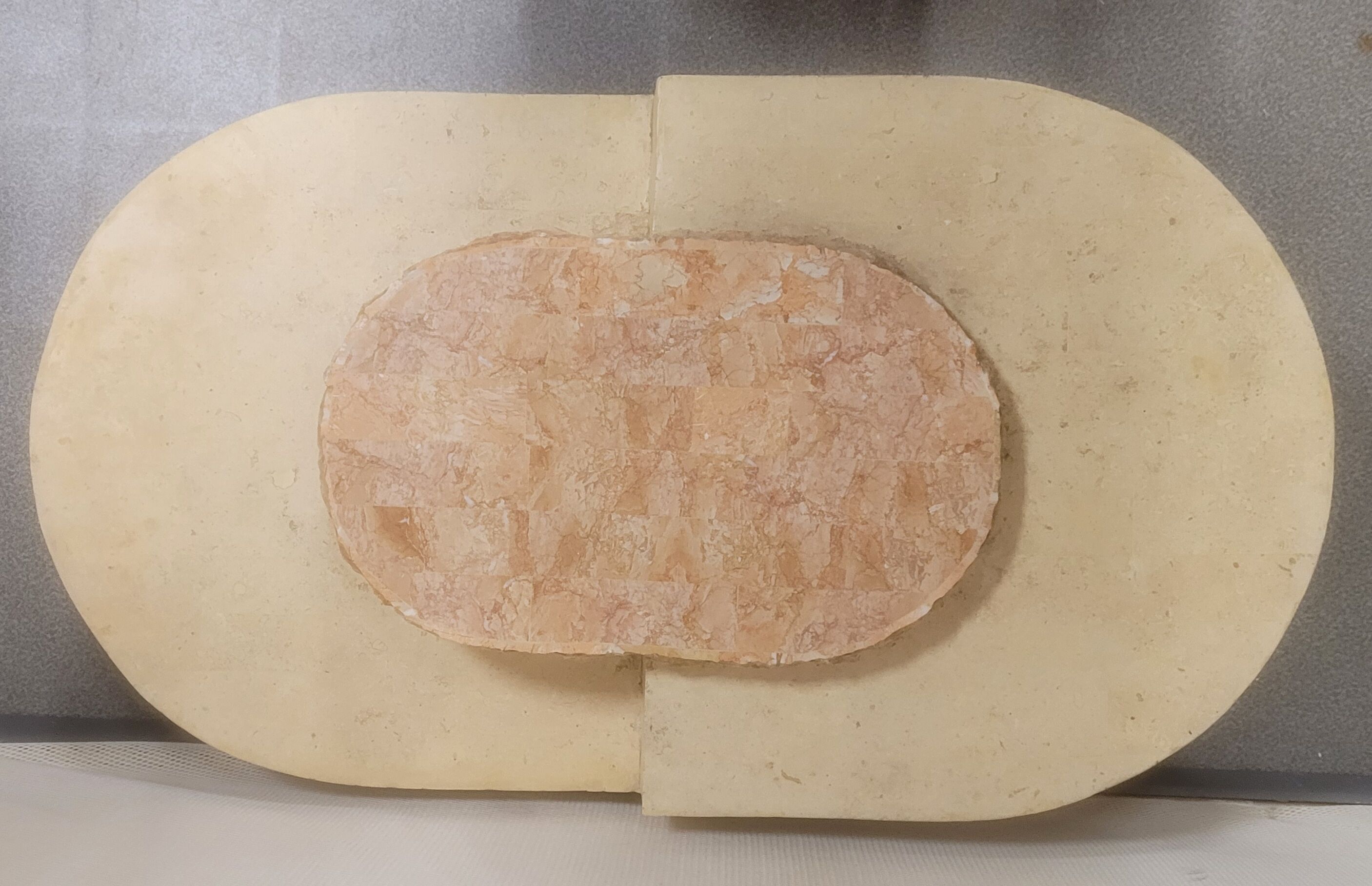 Oval stone coffee table Mactan brutalist marble by Magnussen PONTE