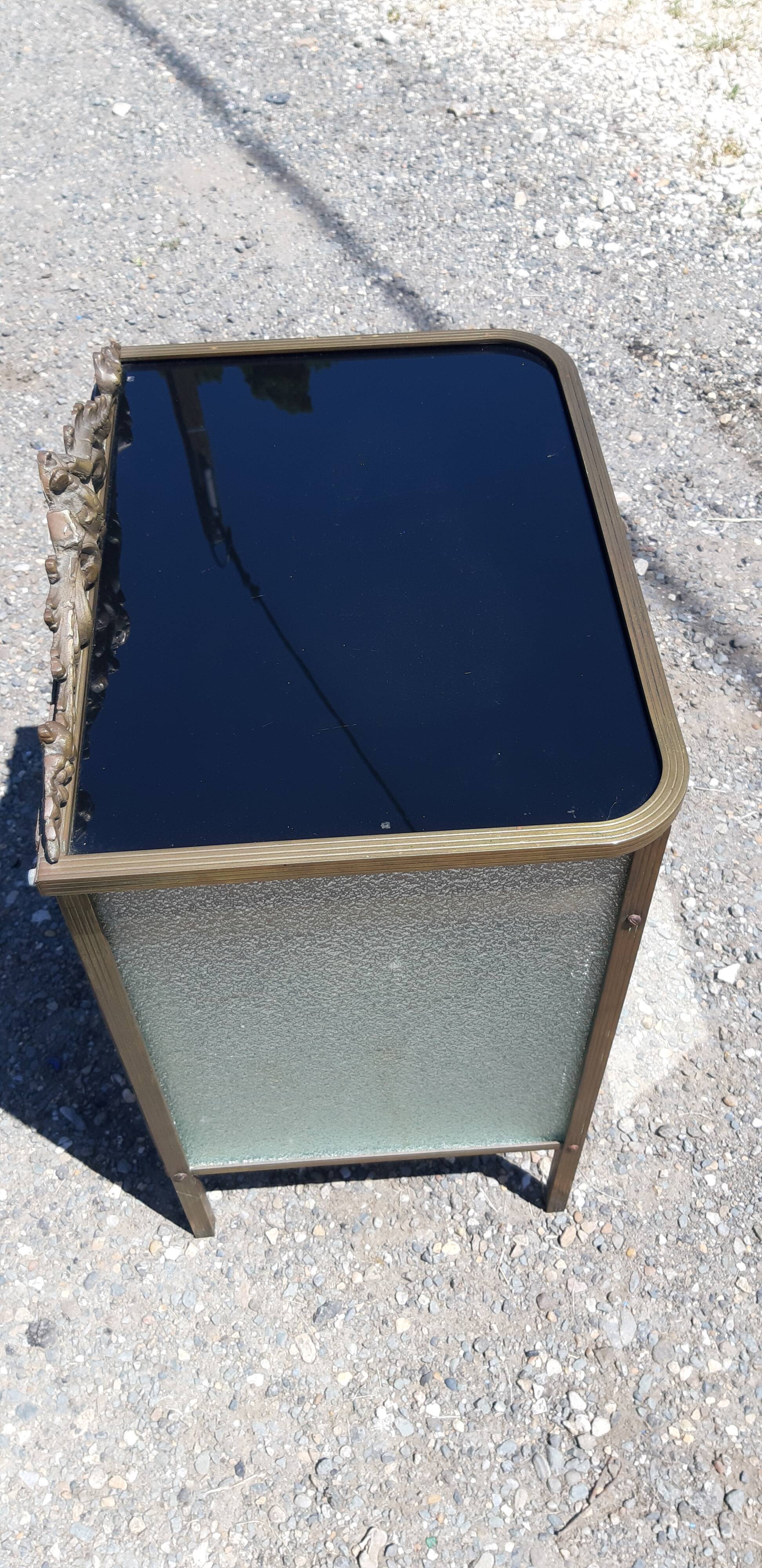 Golden metal empire style bedside