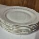 Set of 7 fine porcelain dessert plates with gilding, SFP, French company