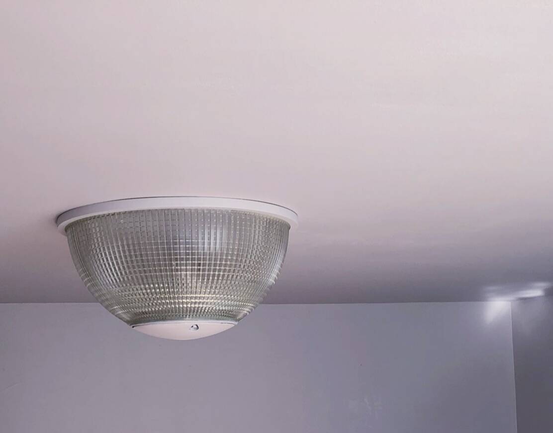 White holophane wall light