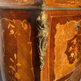 Curved secretary and inlaid with floral branches in Louis XV style