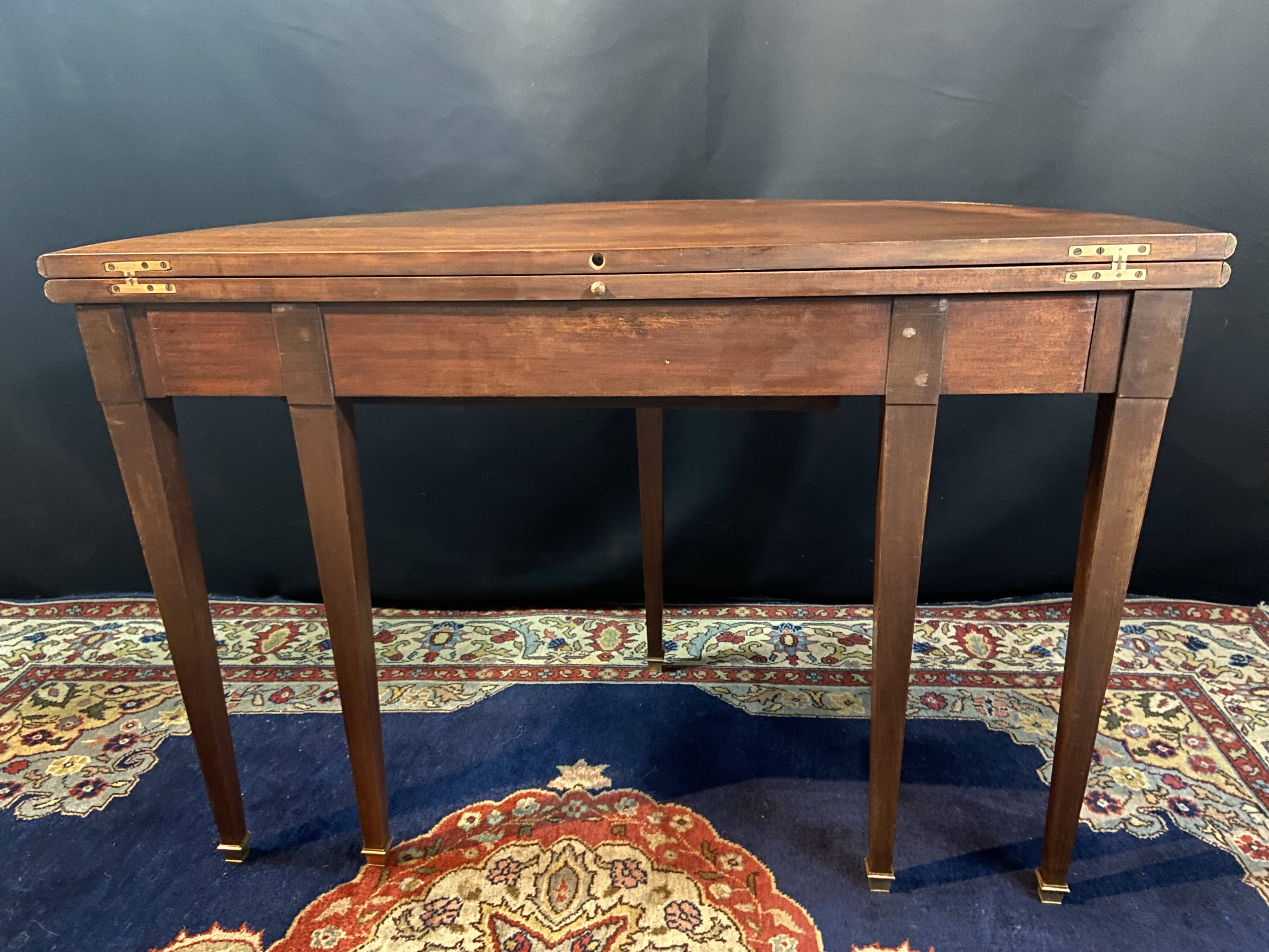 Console table demi-lune 19th century Louis XVI modular foldable top in mahogany.
