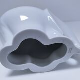Two iridescent black and white ceramic elephants design