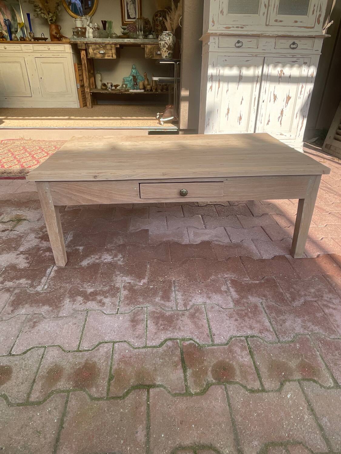 Wooden coffee table with drawer
