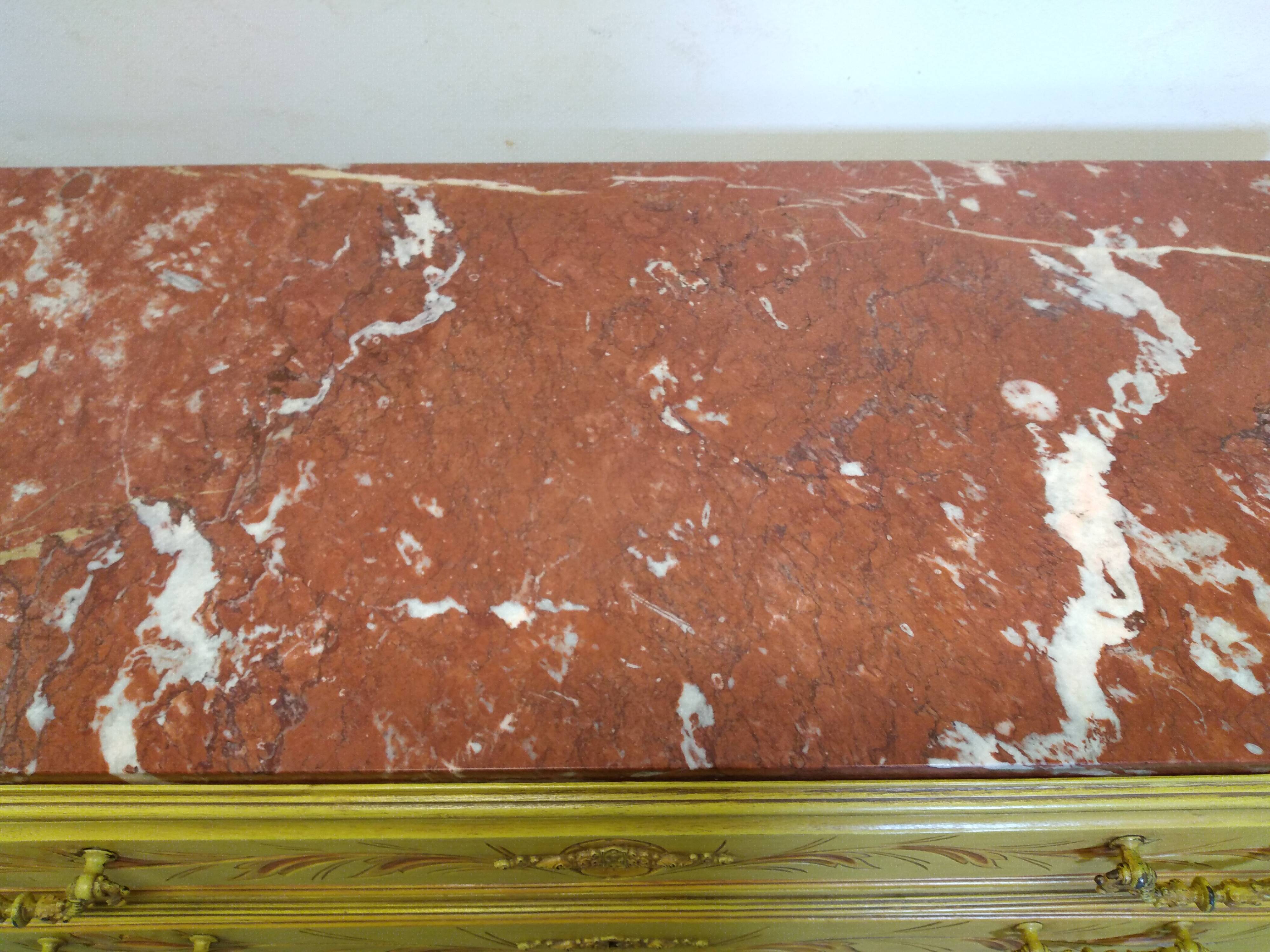 Antique chest of drawers with marble