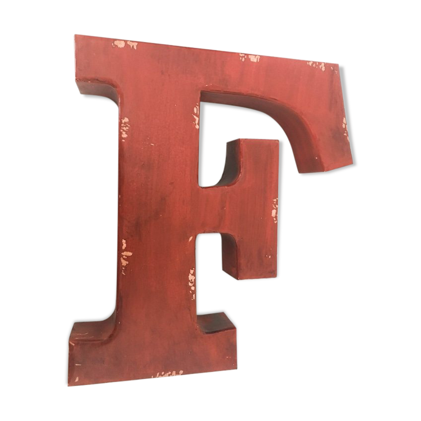 Red metal "F" sign letter
