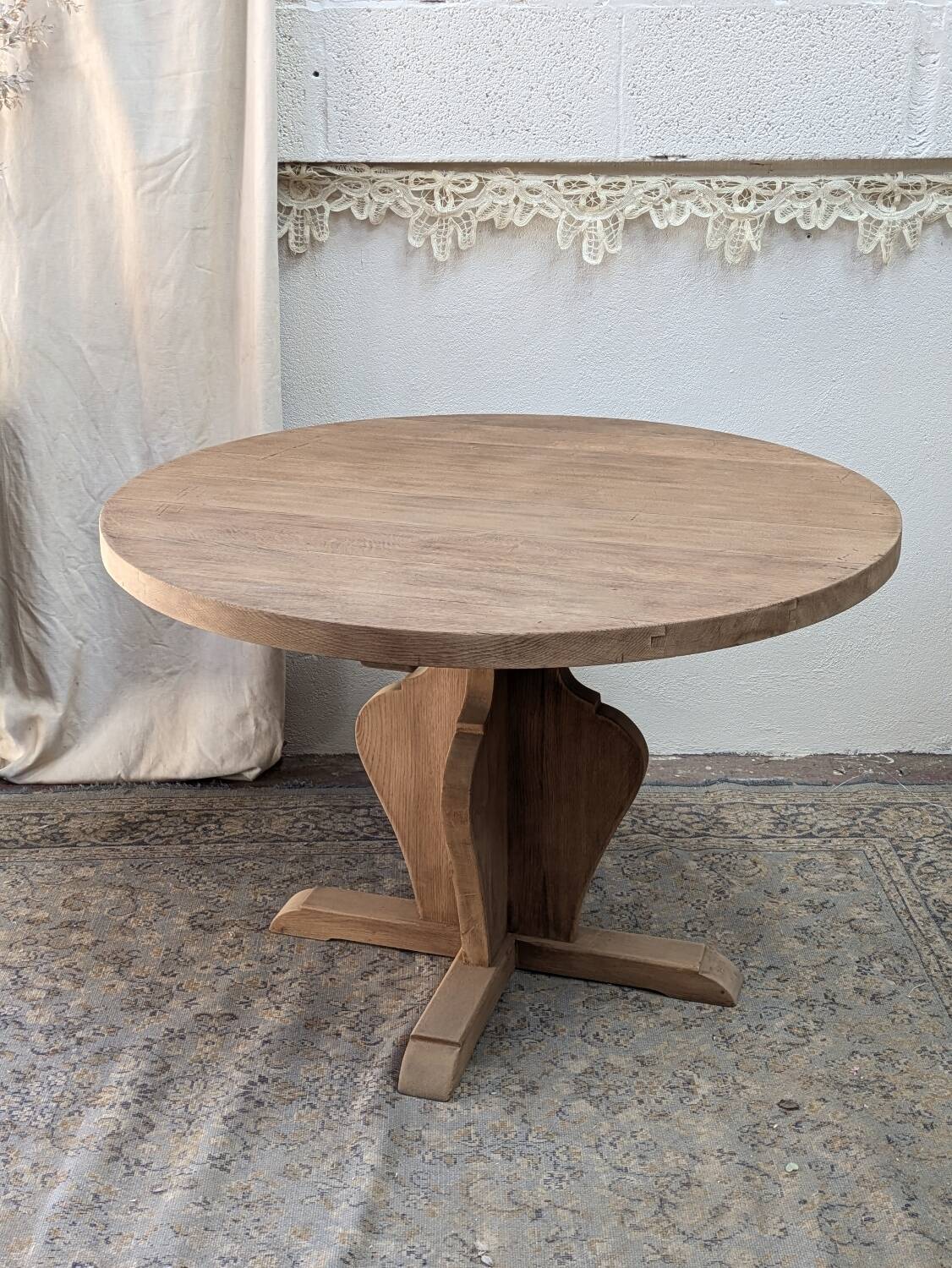 Round table in raw oak