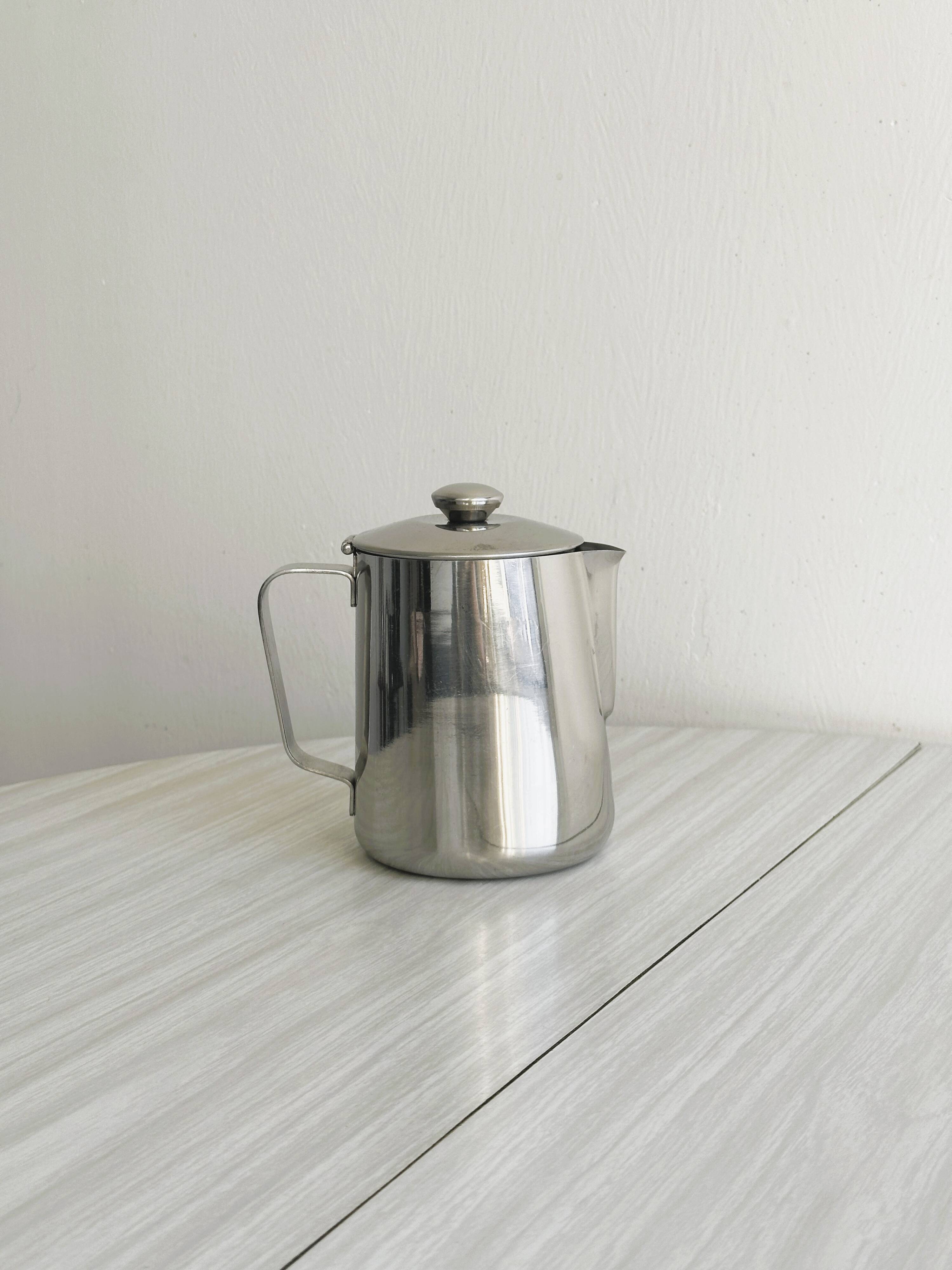 Milk jug, carafe in shiny stainless steel