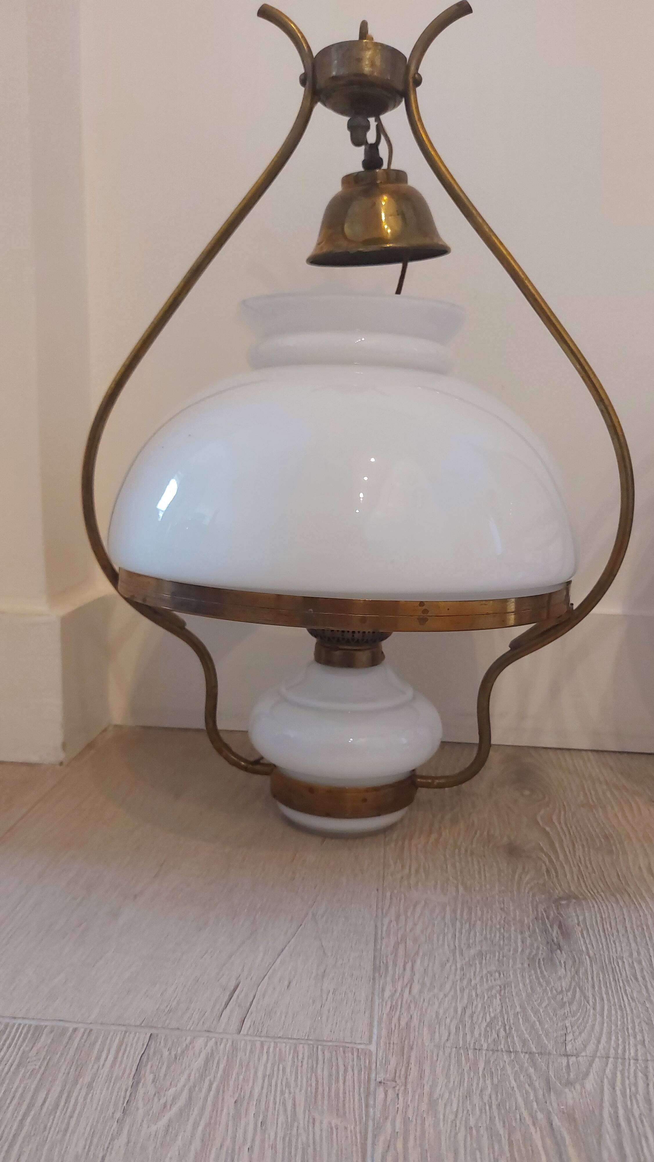 Lots of 1950s copper/ brass suspensions and wall lights with shades.