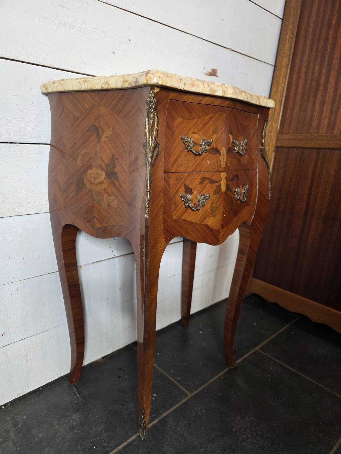 Louis XV style curved bedside table in marquetry