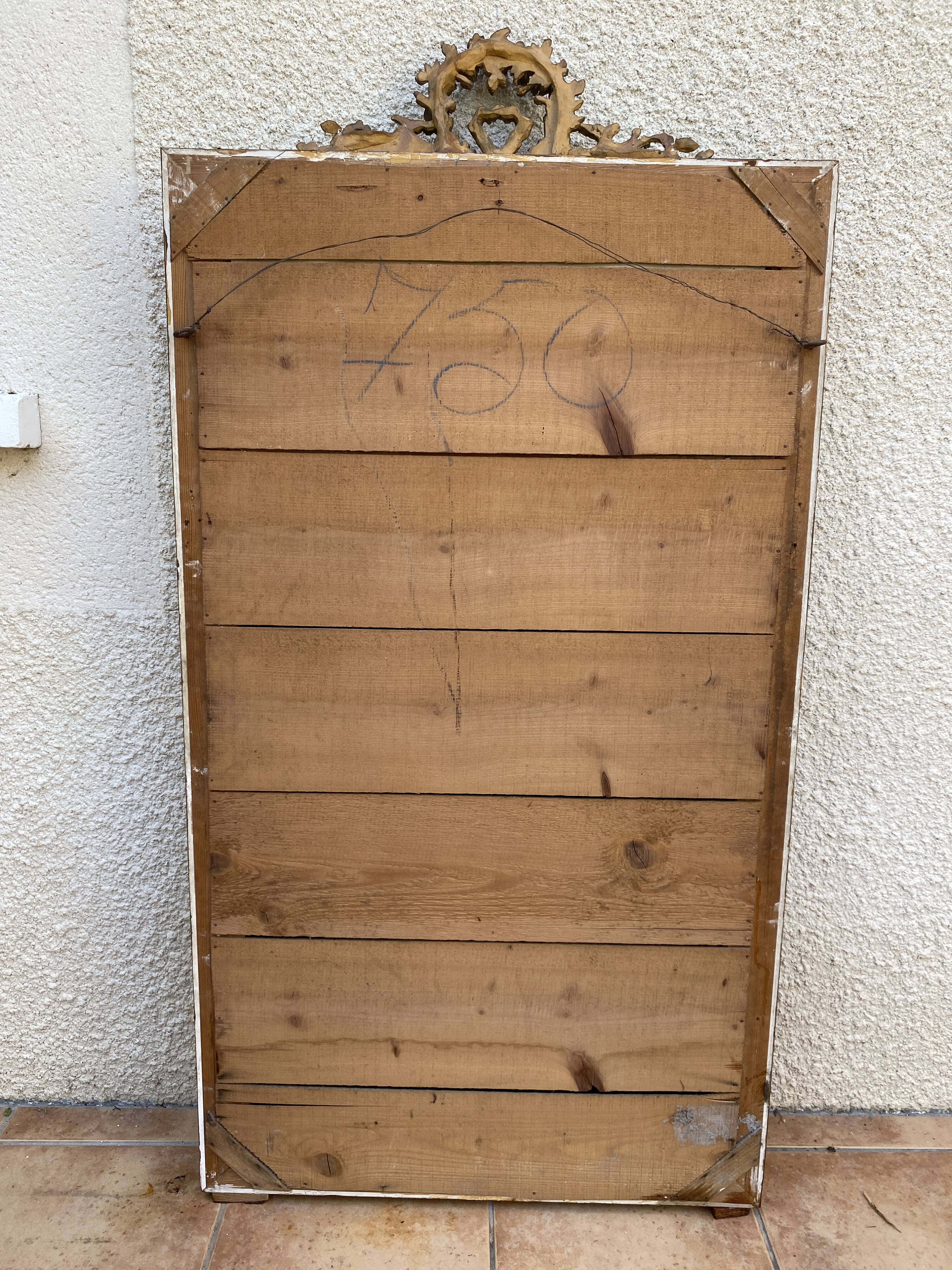 19th century Louis XVI style mirror in wood gilded with gold leaf, 74x150cm