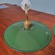 Pair of industrial wall lights in brass and green enameled sheet metal