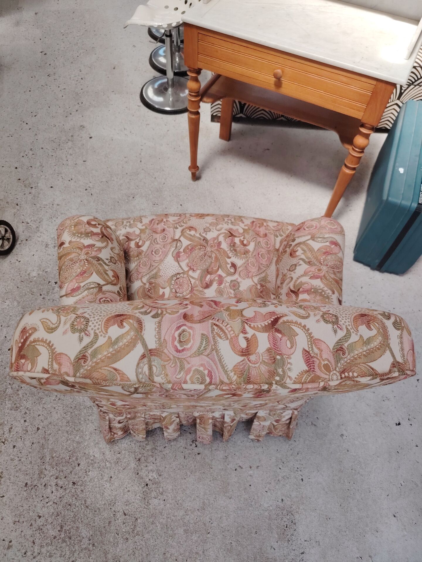 Antique armchair fully restored with brass wheels.