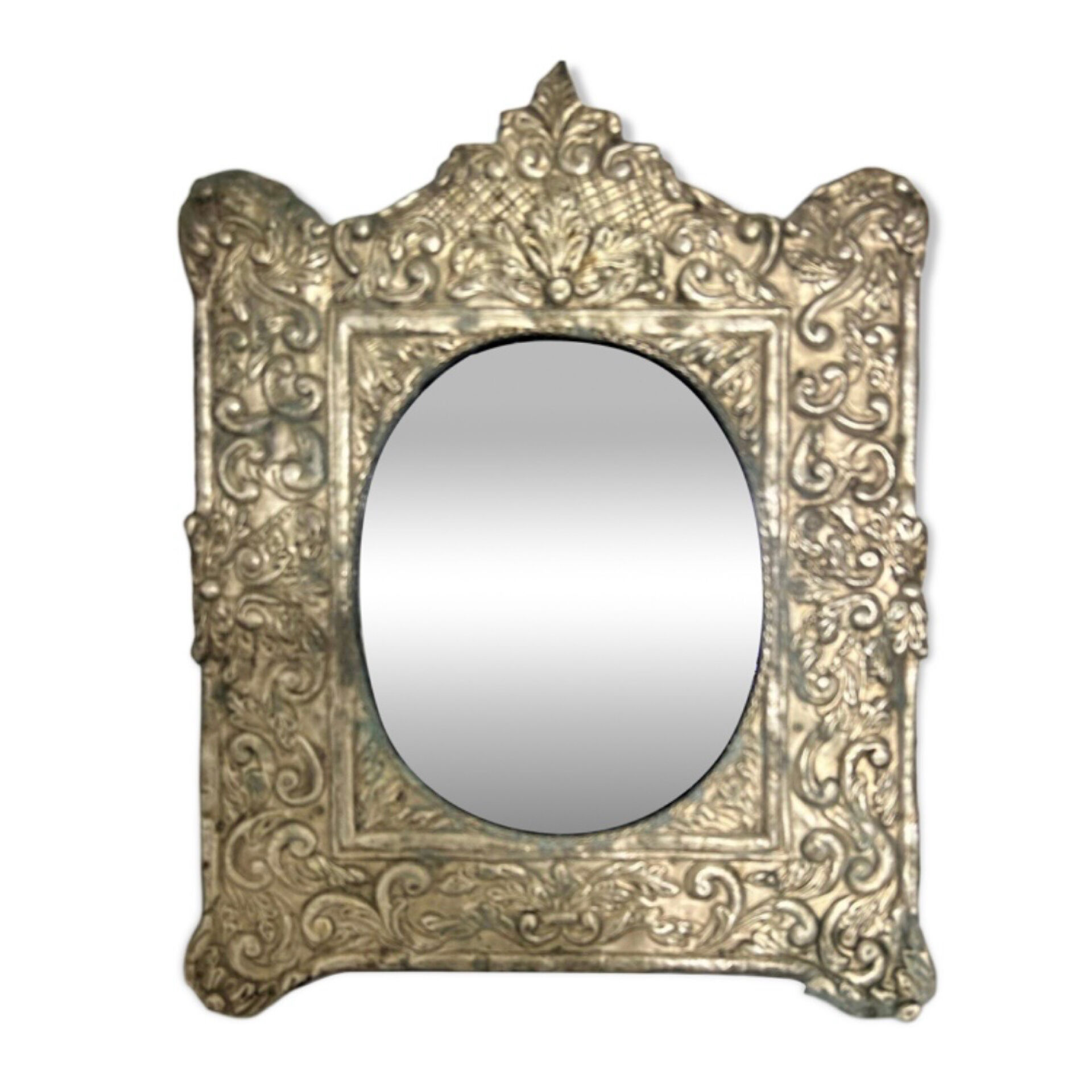Baroque mirror in repoussé brass