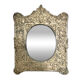 Baroque mirror in repoussé brass