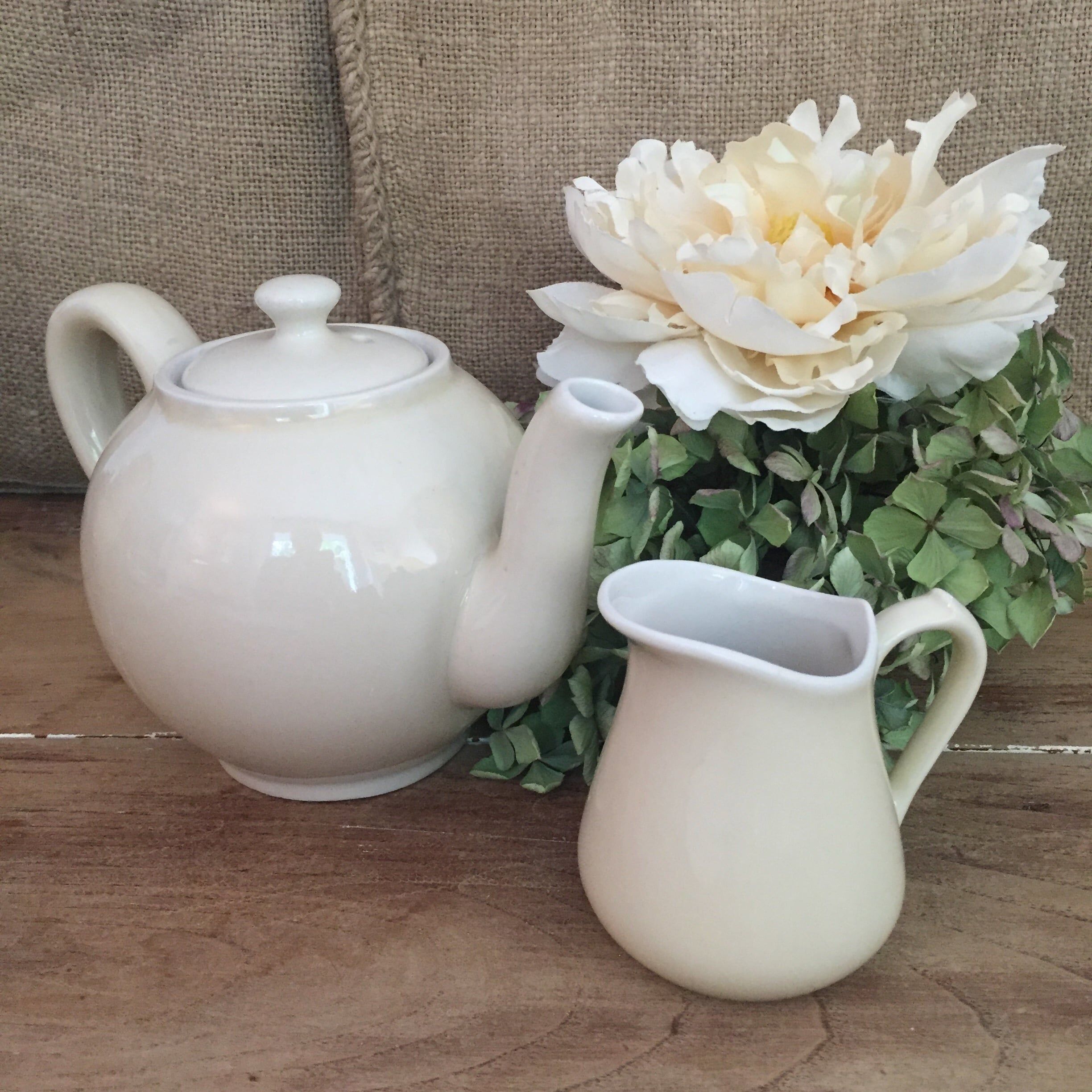 Teapot and vintage milk jar