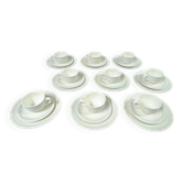 Set of 9 Villeroy and Boch Cortina mugs.