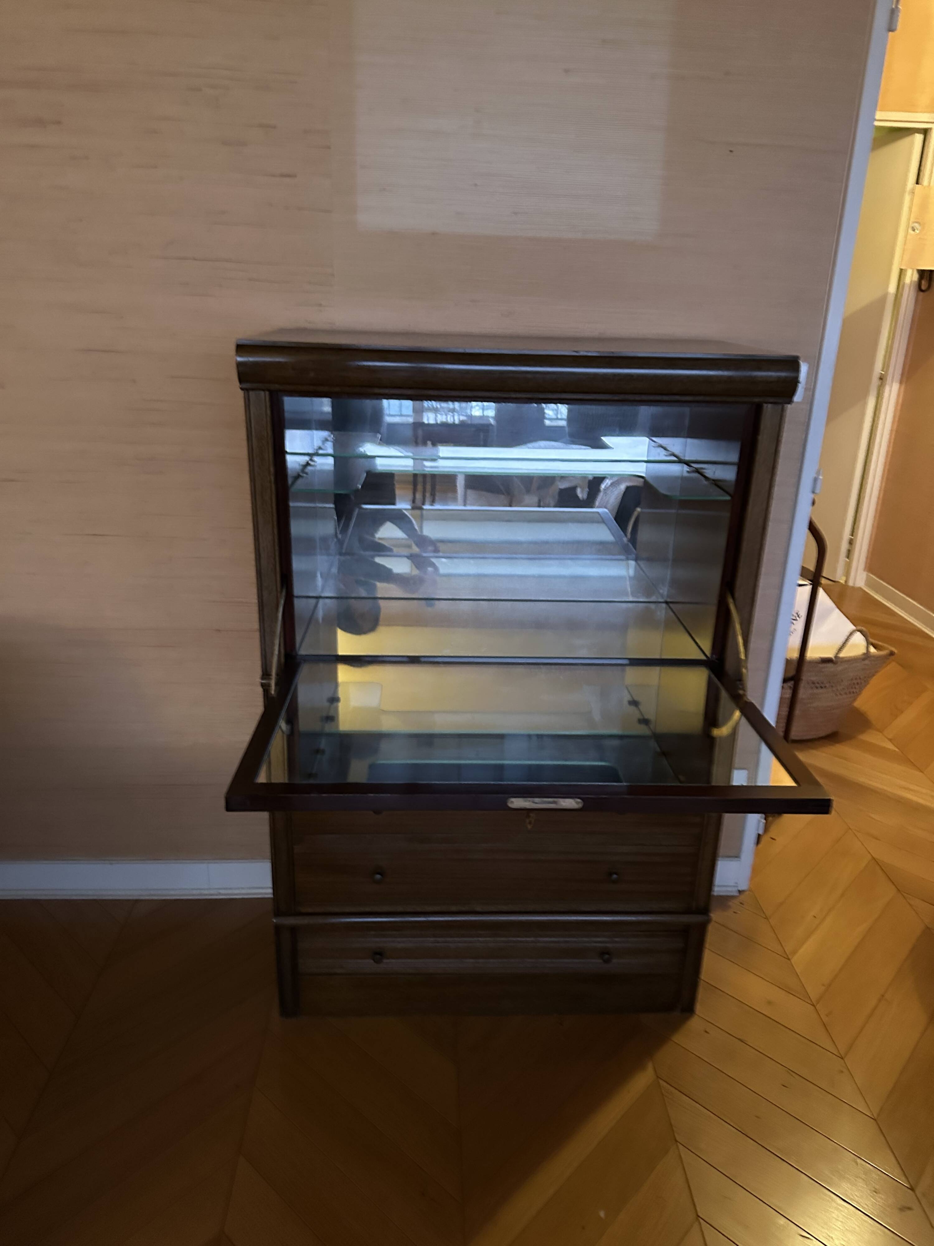 vintage mahogany bar cabinet with front-opening drawers in English style