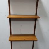 Vintage teak wall system by Poul Cadovious