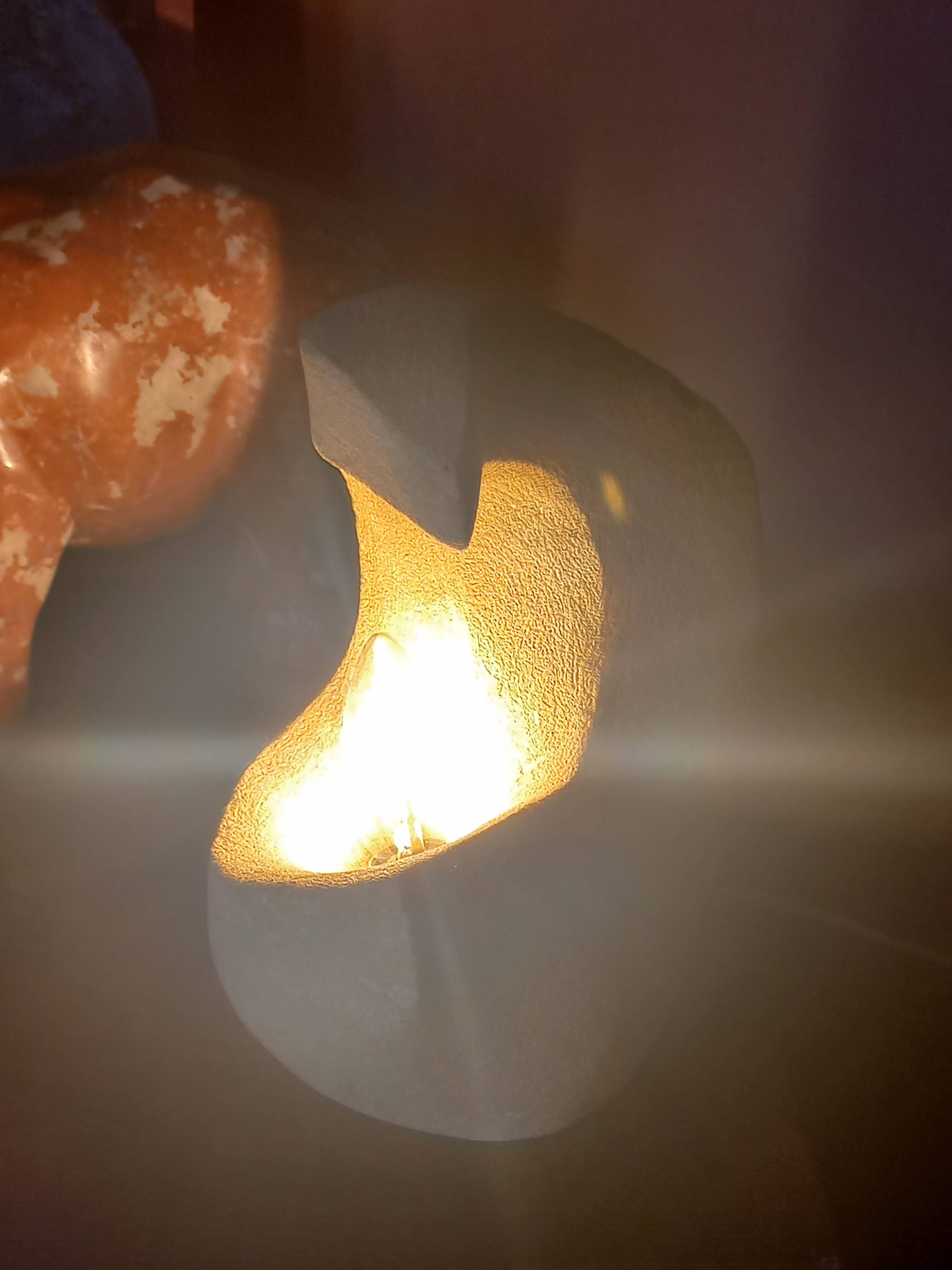 Sculpted stone lamp from the 1970s, signed.