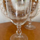 Set of two engraved glass wine glasses