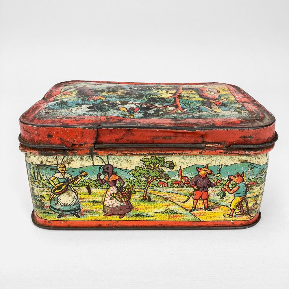 Antique lithographed tin biscuit tins
