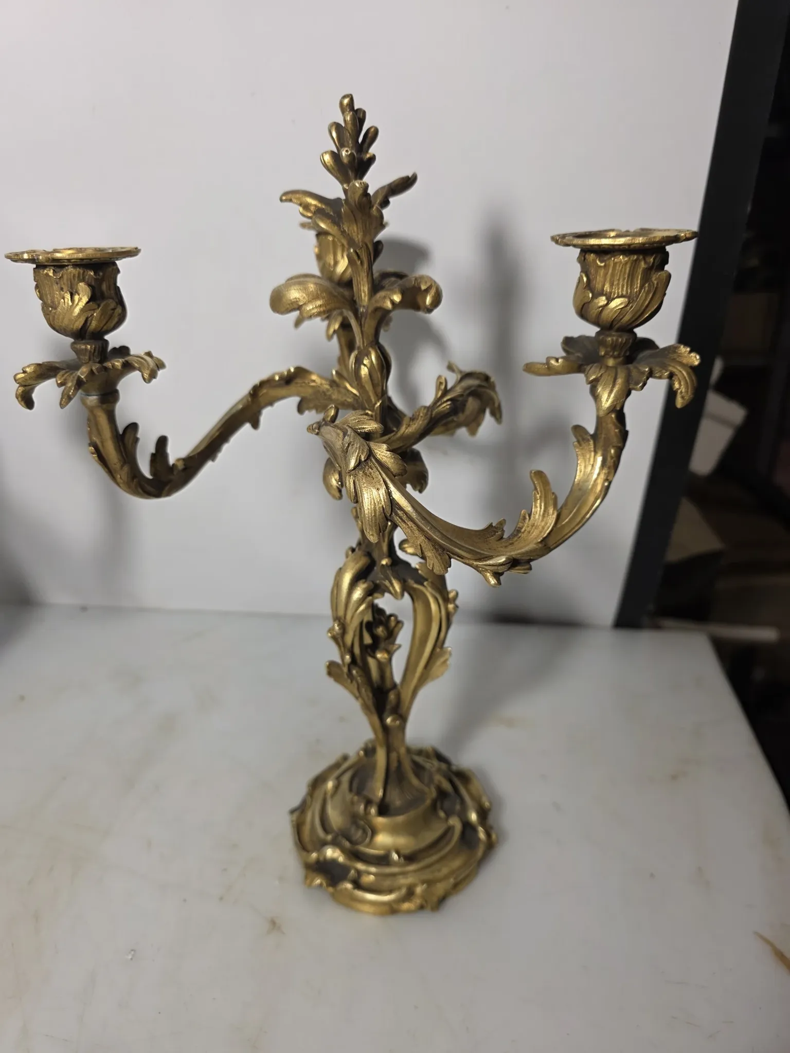 Pair of Louis XV style bronze candlesticks from the 19th century.