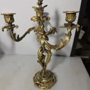 Pair of Louis XV style bronze candlesticks from the 19th century.